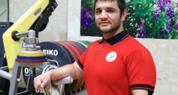 مقام هفتم مسابقات جهانی حاصل تلاش وزنه بردار بسیجی کرمانشاهی 