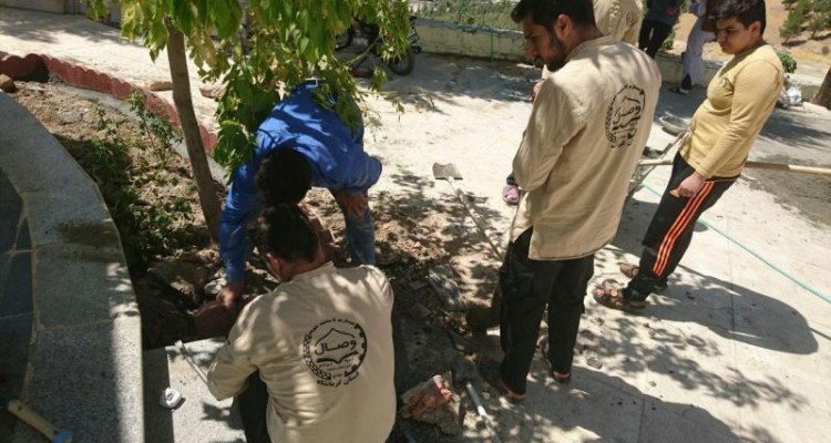 مرمت و ساماندهی مزار شهدای گمنام شهر صحنه توسط گروه جهادی وصال این شهرستان / در راستای  اجرای رزمایش اقتدار عاشورایی سپاهیان محمد رسول الله