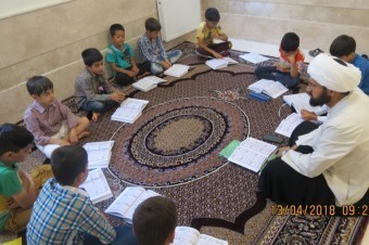 برگزاری کلاس روخوانی سطح یک قرآن در روستای بیدسرخ شهرستان صحنه 